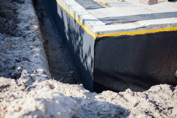 Professional Waterproofing technician working in Salem, NC